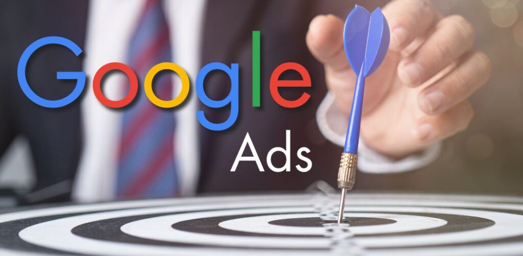 Google ads, mano con freccetta che fa centro
